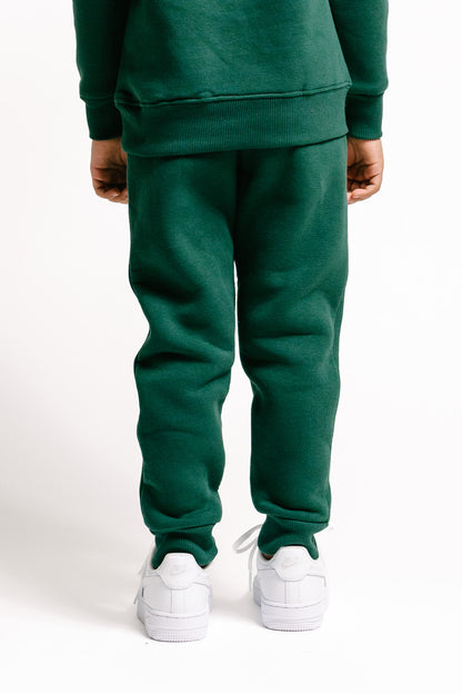 Unisex Kinder-Jogginghose in Bottle Green mit Taschen für Style und Komfort!