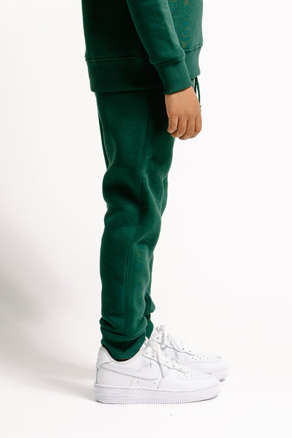 Unisex Kinder-Jogginghose in Bottle Green mit Taschen für Style und Komfort!